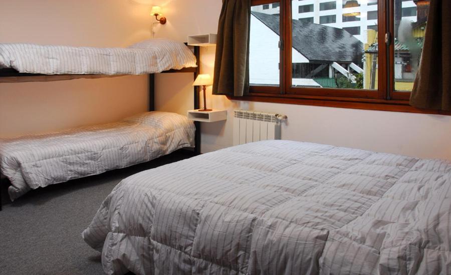 Hostel Los Troncos San Carlos de Bariloche Pokoj fotografie